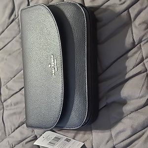 NWT Kate Spade Small leather black crossbody with silver hardware.